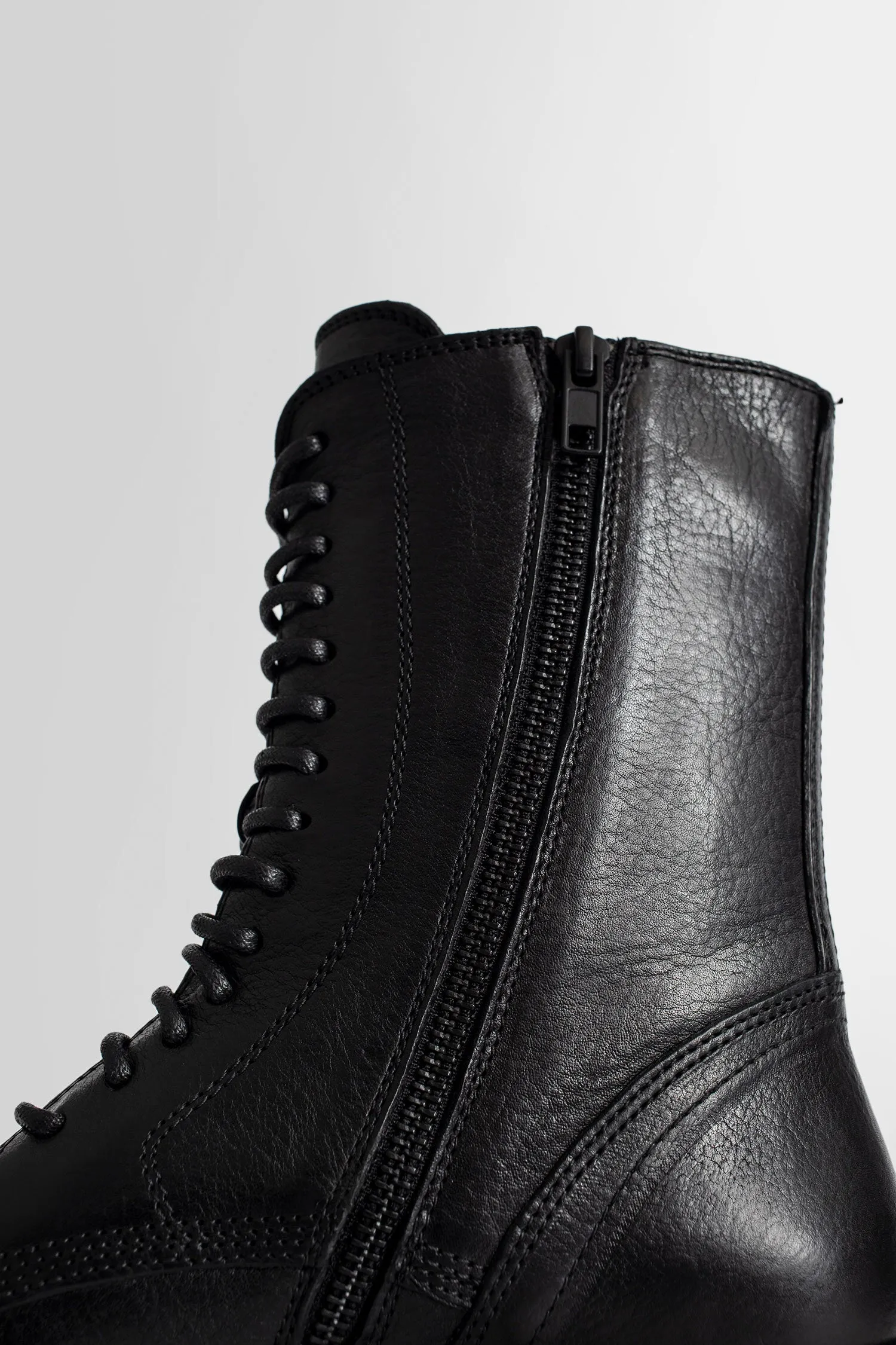 ann demeulemeester combat boots with laced-up design