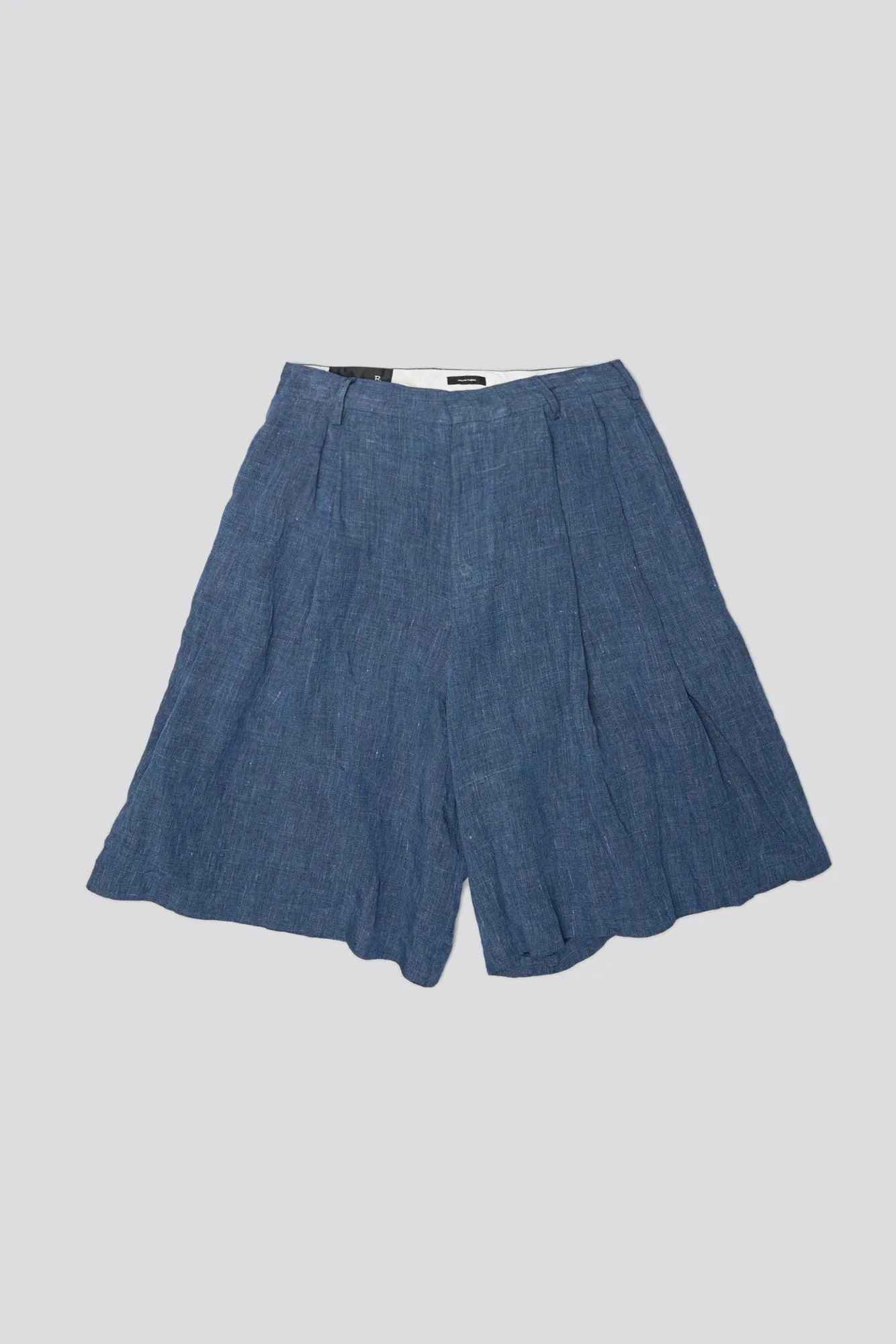 Dark indigo pleated culottes for a stylish look